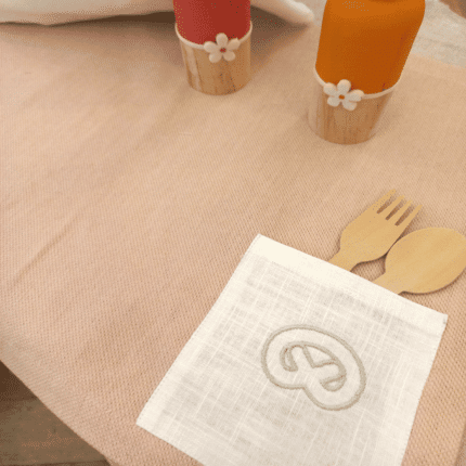 set en lin rose à poche brodée bretzel